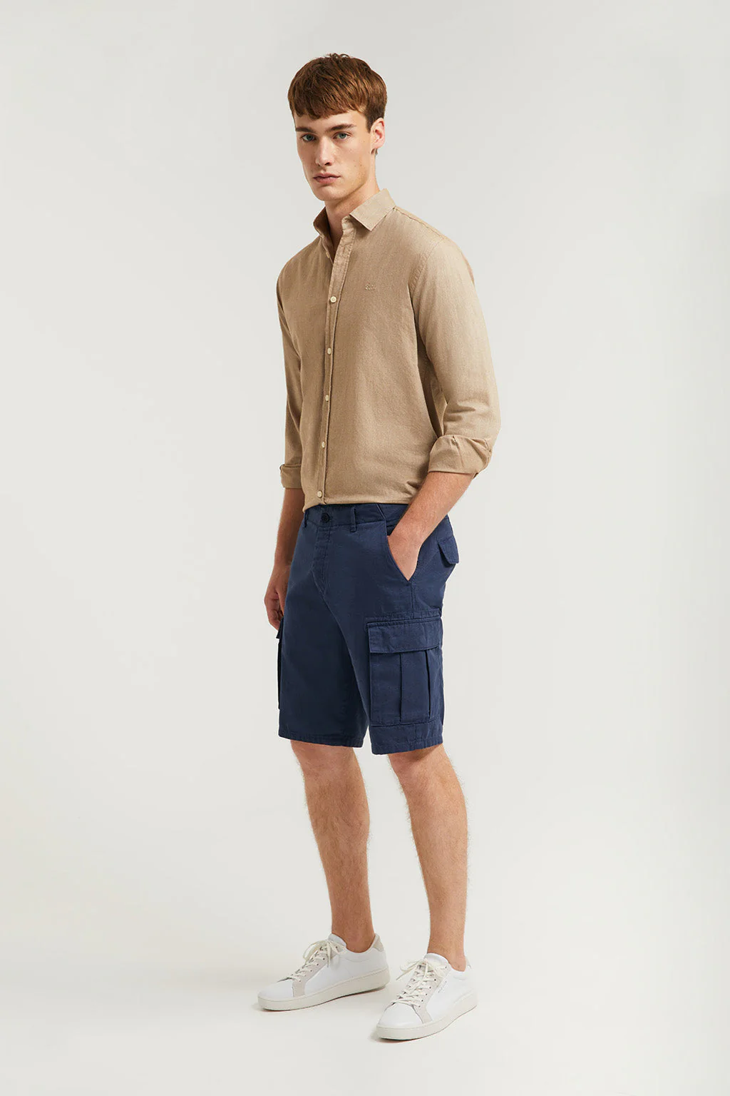 Navy-blue cargo shorts with embroidered logo