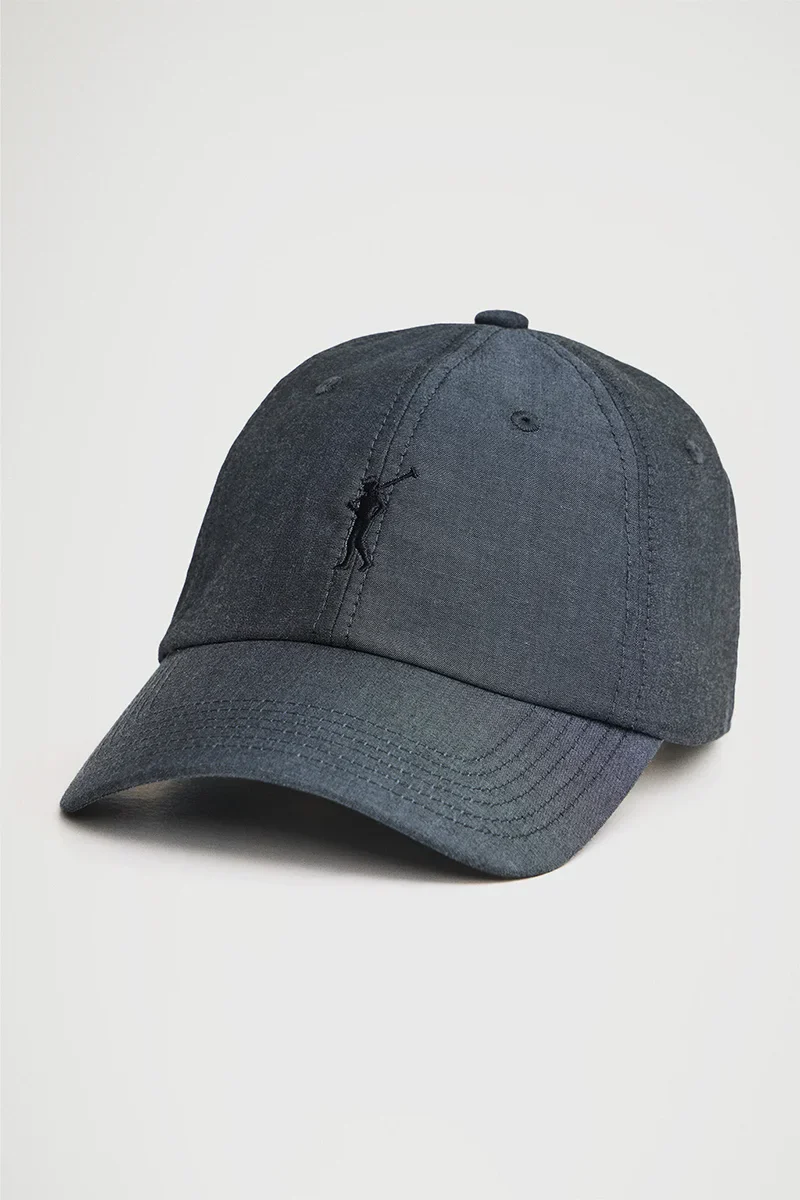 Denim-blue six-panel chambray cap with Rigby Go logo