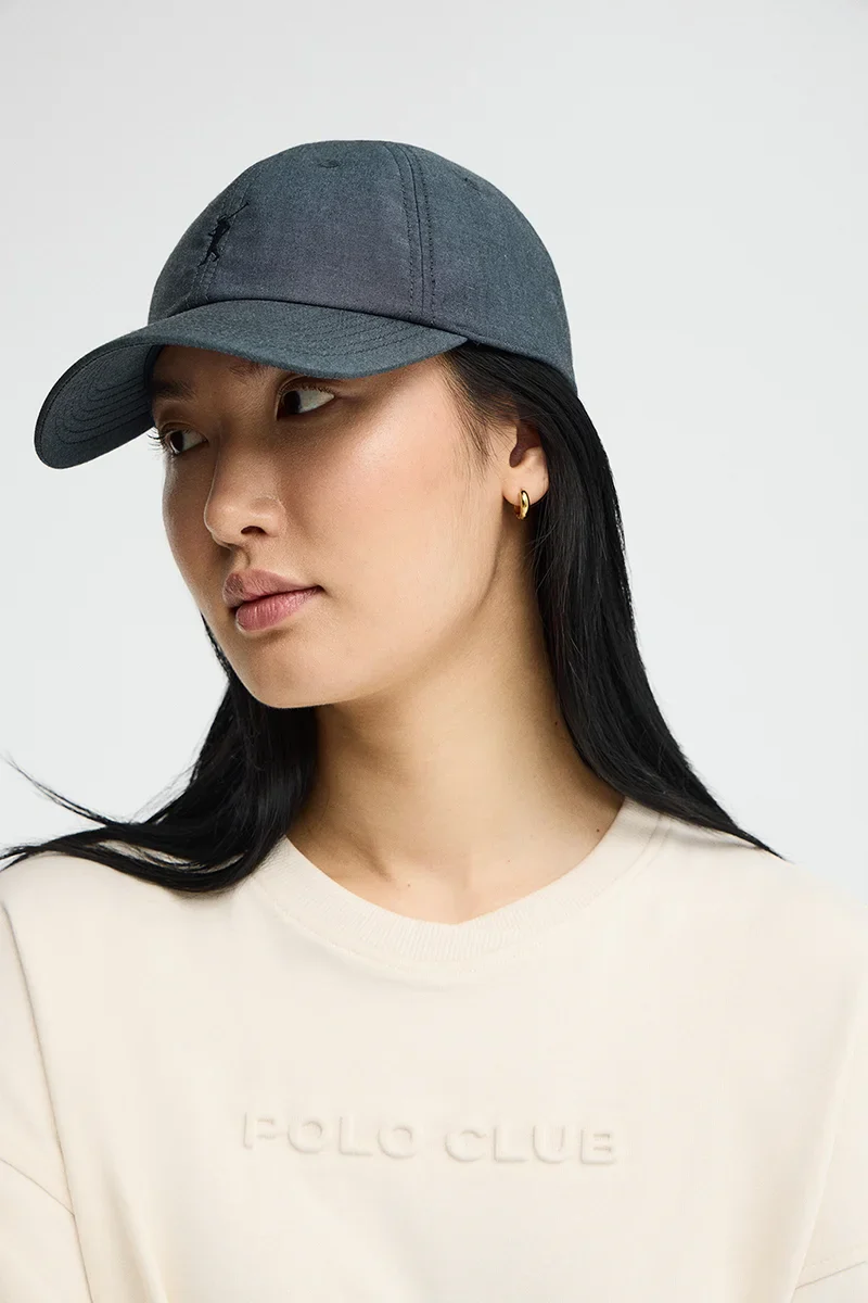 Denim-blue six-panel chambray cap with Rigby Go logo - Image 3