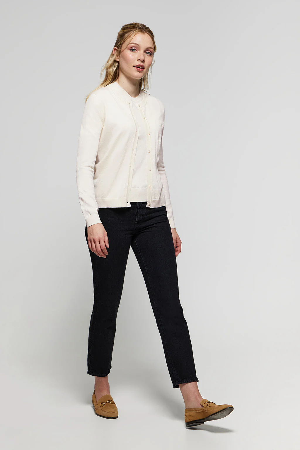 Beige knit cardigan with buttons and embroidered Rigby Go logo