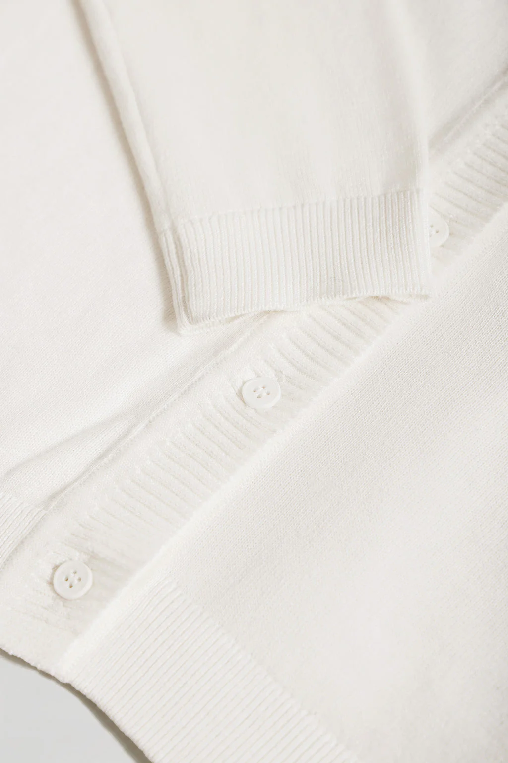 Beige knit cardigan with buttons and embroidered Rigby Go logo - Image 7