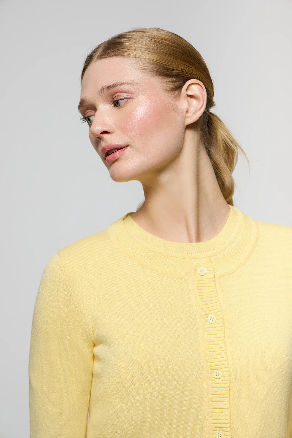 Light-yellow knit cardigan with buttons and embroidered Rigby Go logo - Image 2