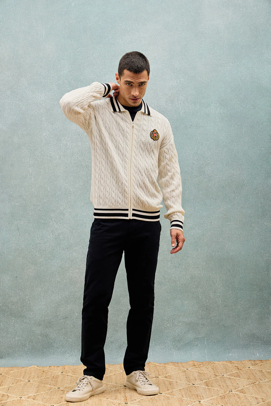 Beige cable-knit cardigan with zip and nautical logo - Image 10