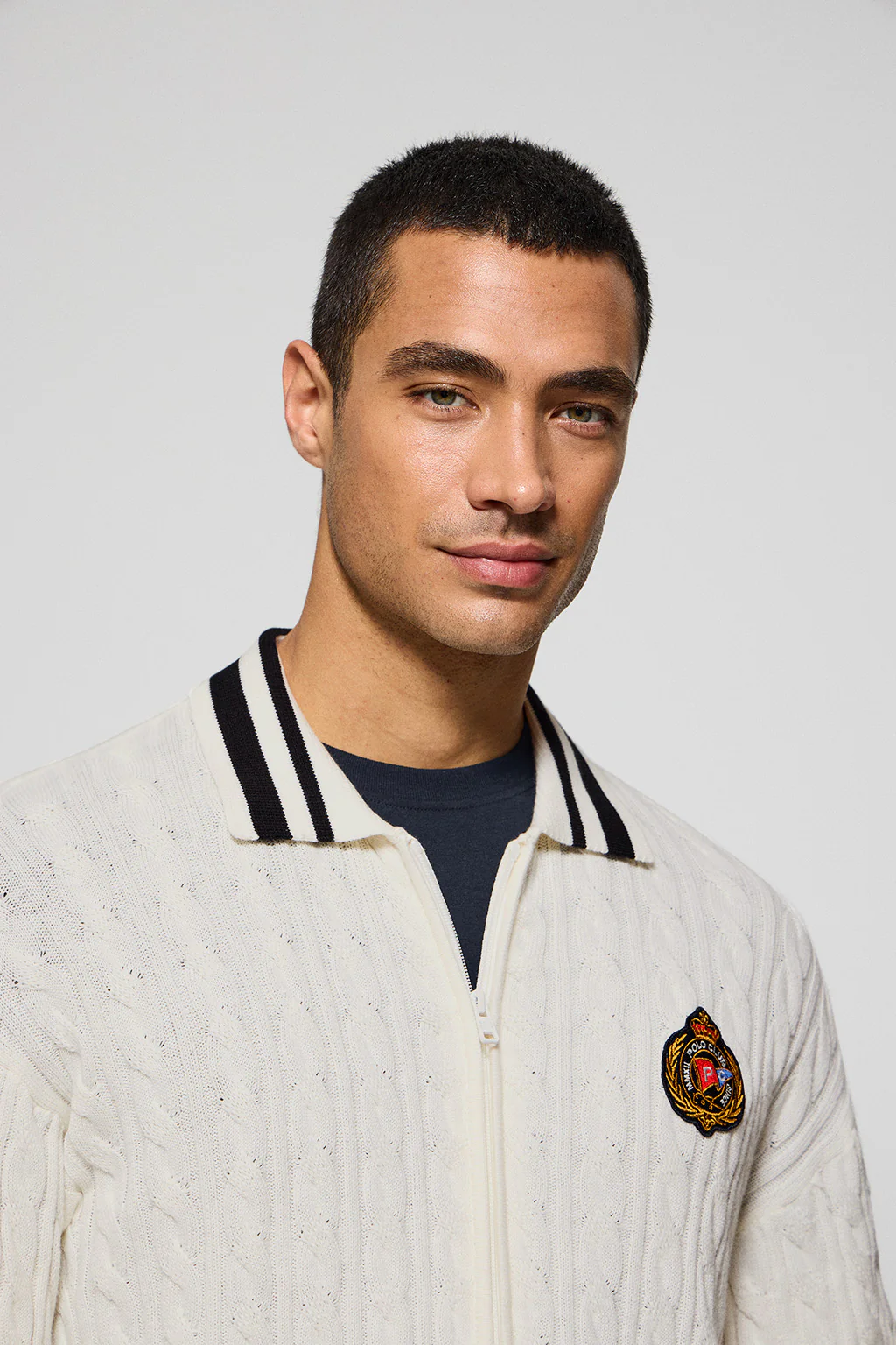 Beige cable-knit cardigan with zip and nautical logo - Image 3
