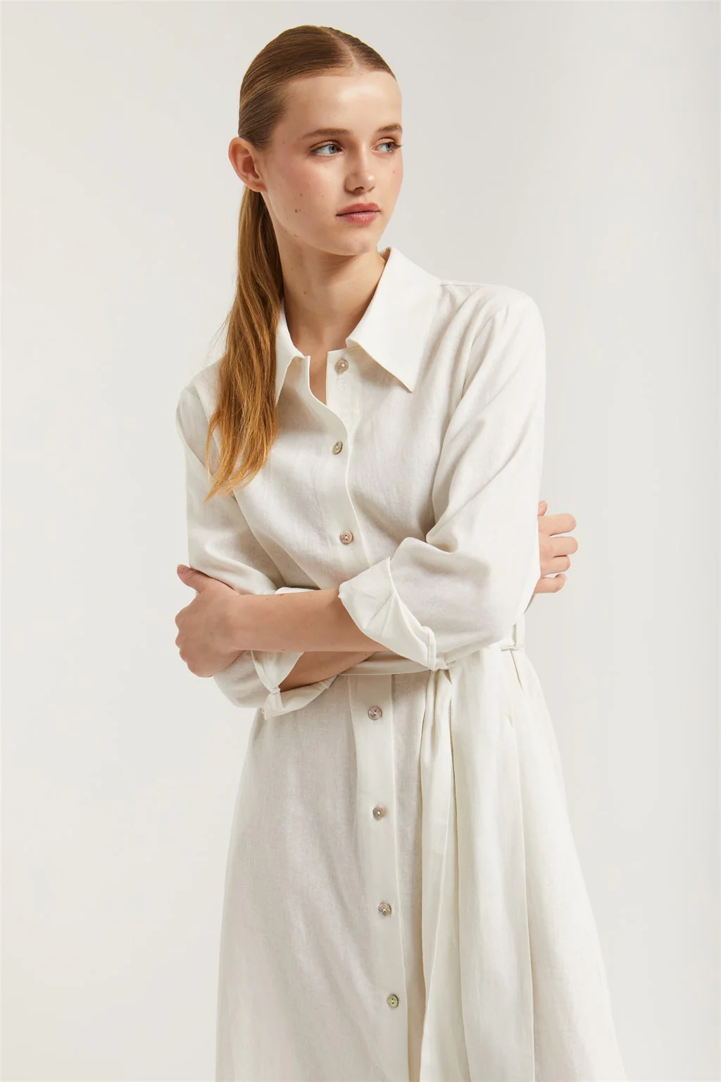 White linen midi dress with embroidered detail