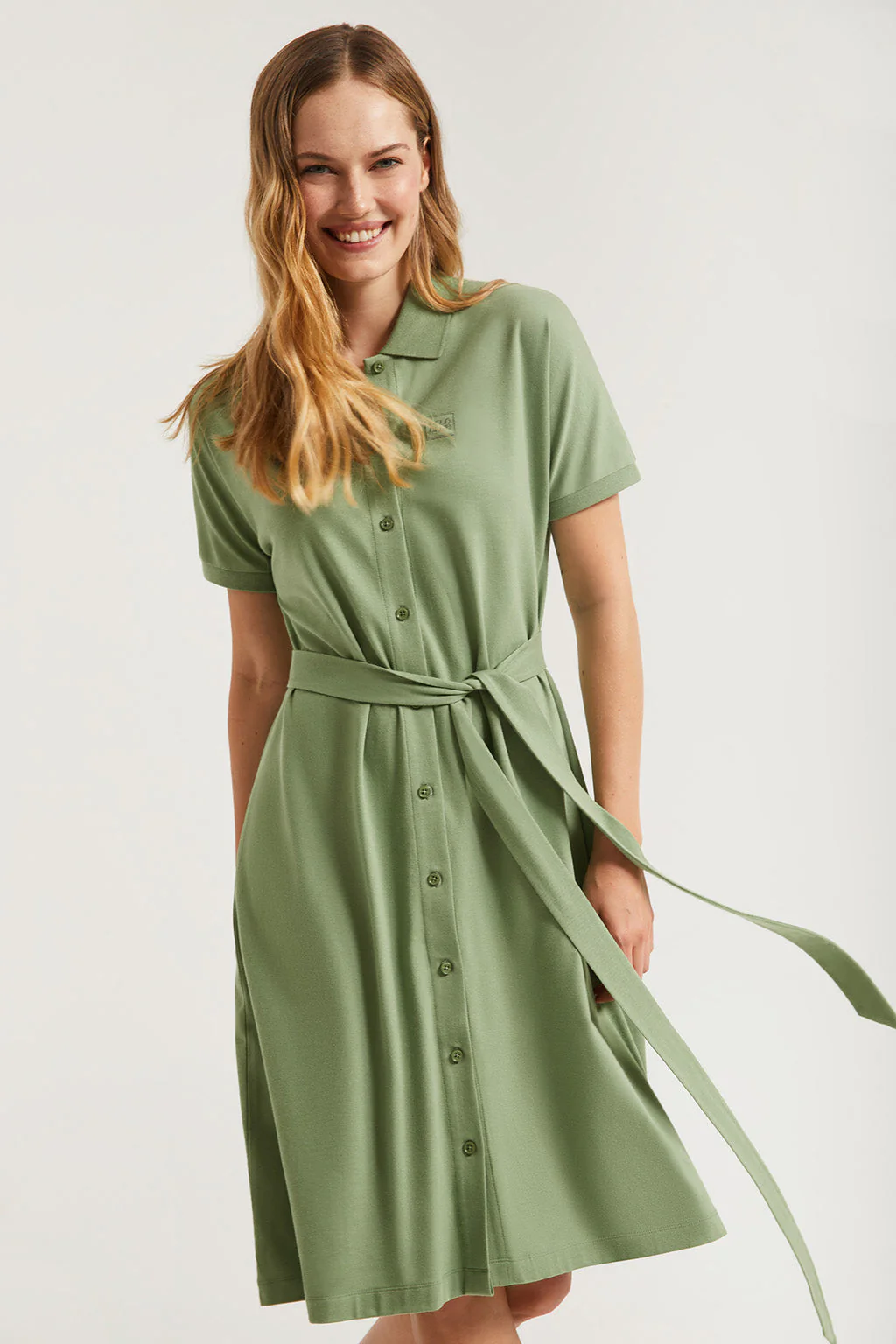 Green midi dress with embroidered logo in matching colour