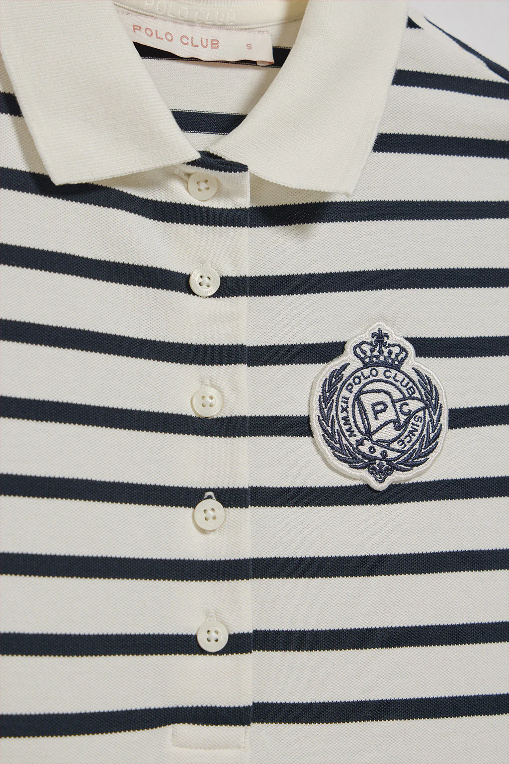 Nude striped polo dress with nautical patch - Image 6
