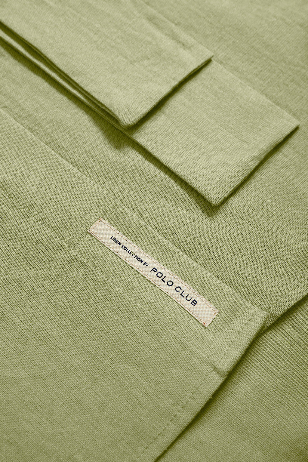 Green linen midi dress with Rigby Go embroidered detail - Image 10