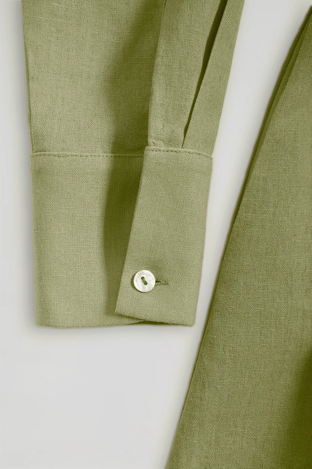 Green linen midi dress with Rigby Go embroidered detail - Image 9