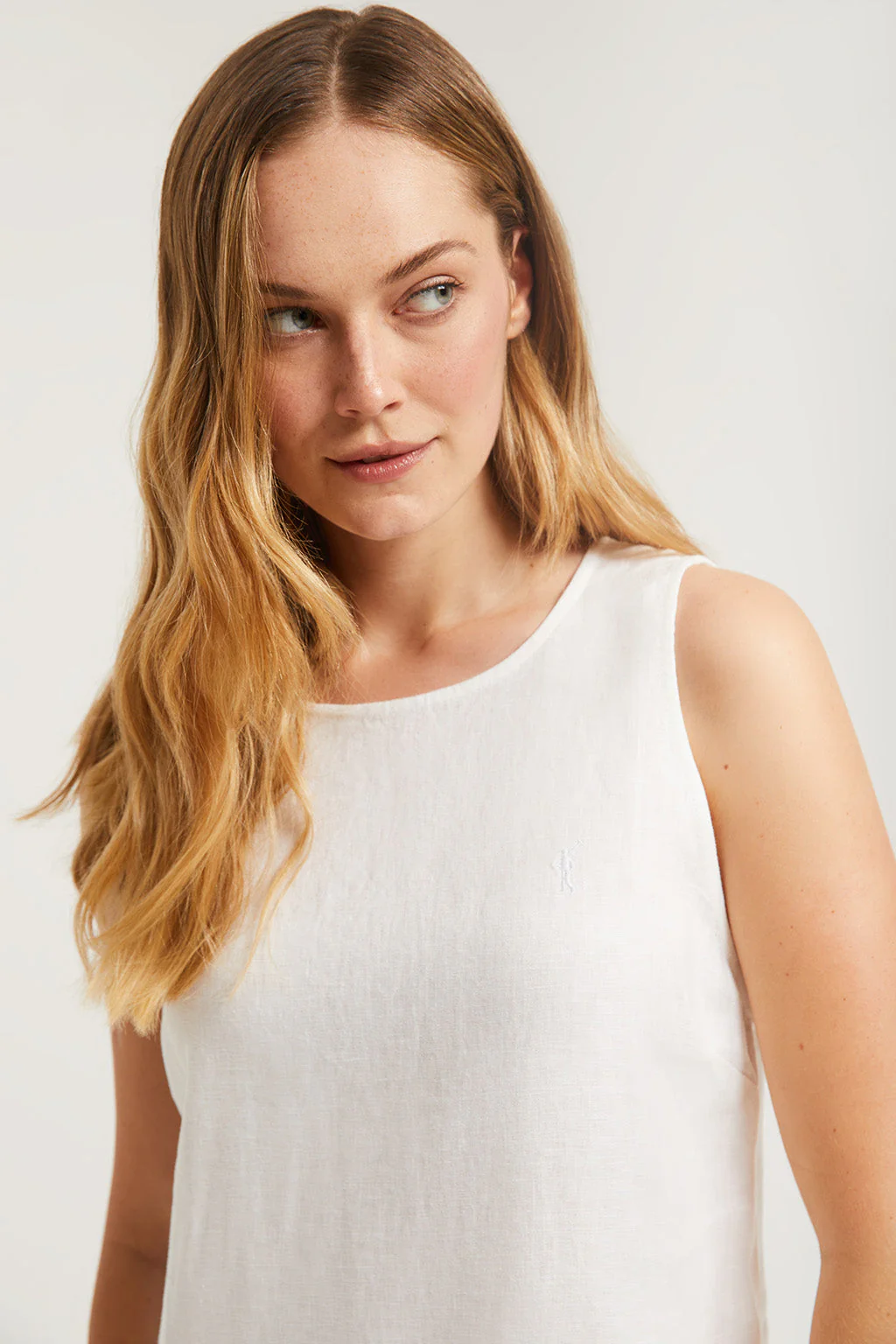 White sleeveless linen dress with Rigby Go logo - Image 3