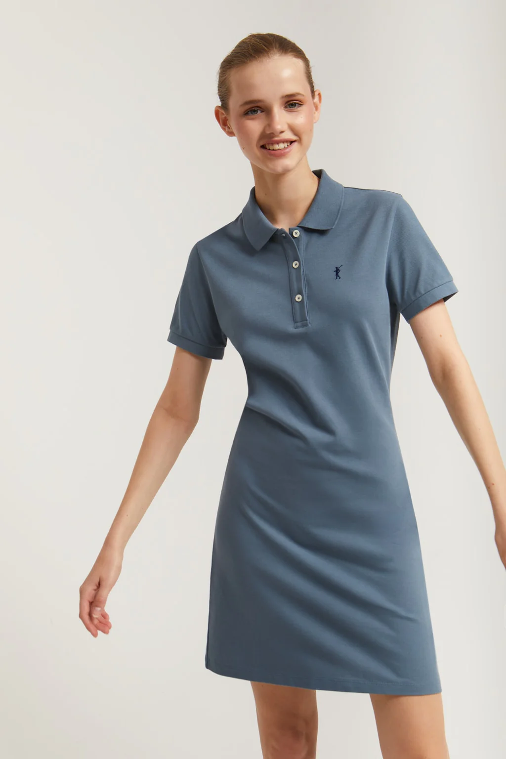 Denim-blue short-sleeve popover dress with Rigby Go embroidery