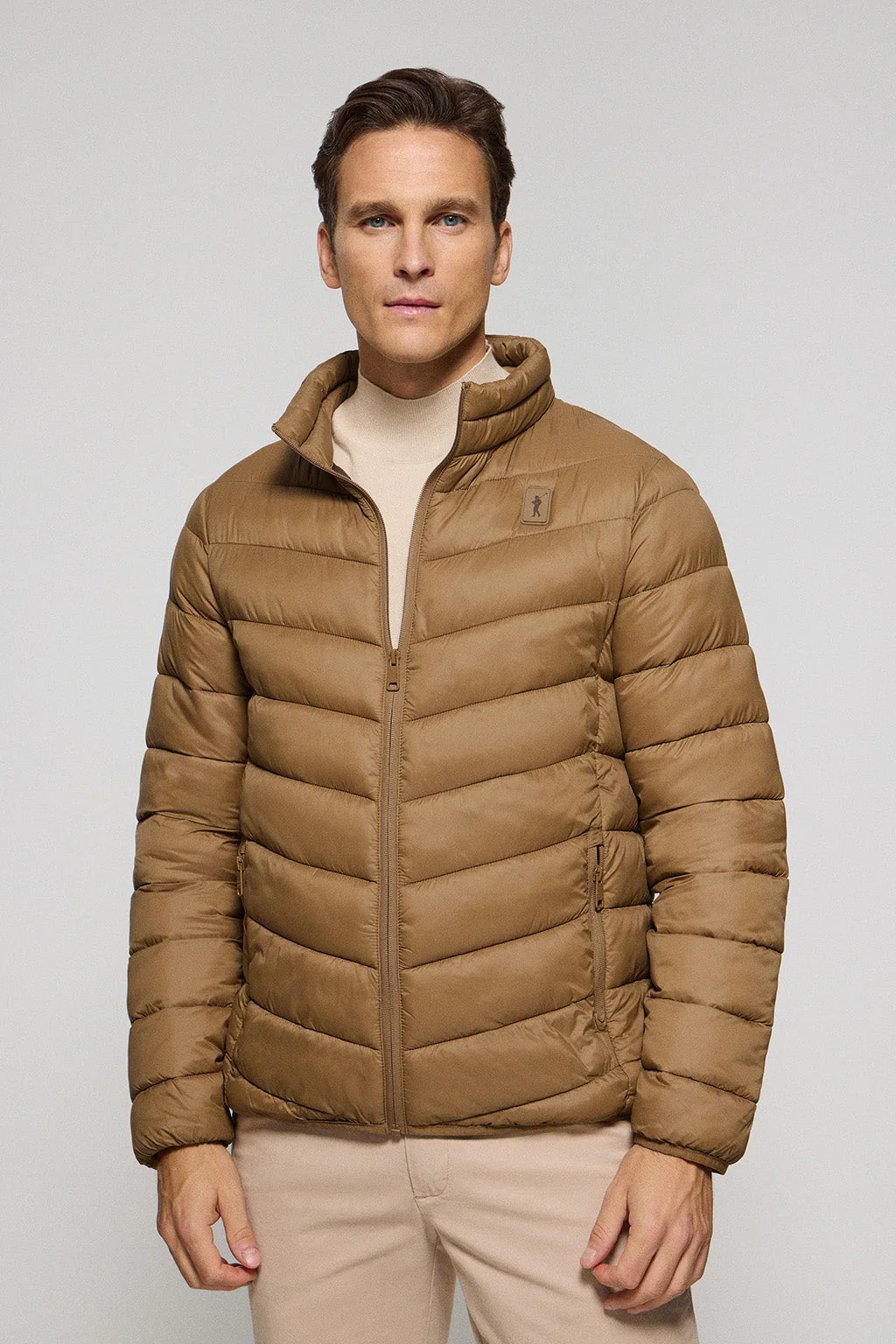 Camel ultralight jacket Chase with Rigby Go patch