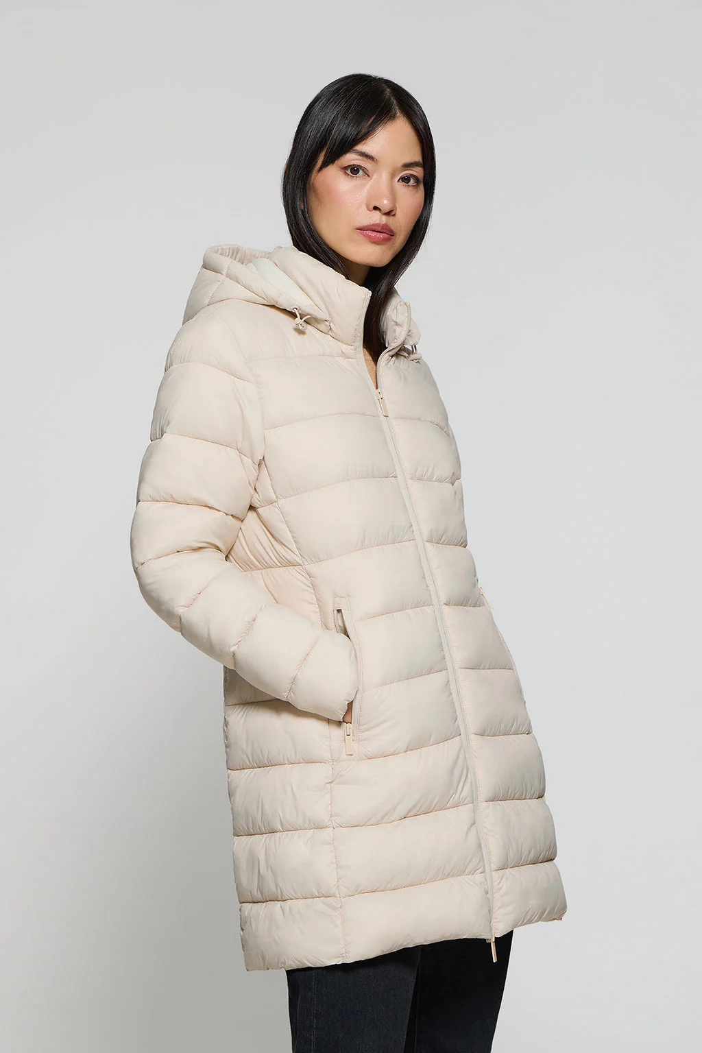 Beige ultralight coat Suzette with Rigby Go patch
