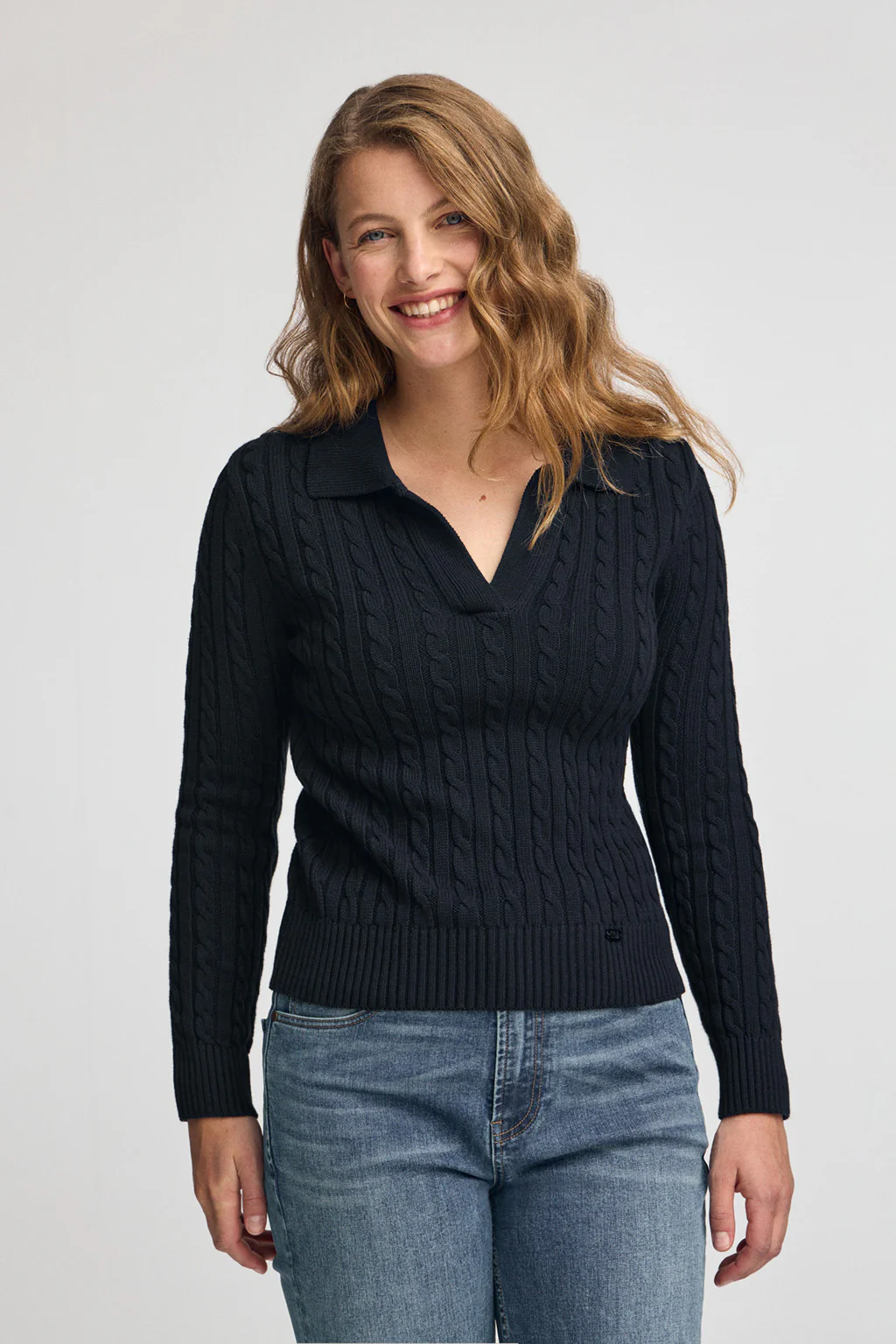 Navy-blue cable-knit jumper with polo collar