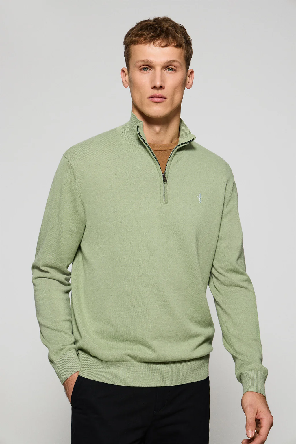 Jade-green zipped jumper with Rigby Best embroidery
