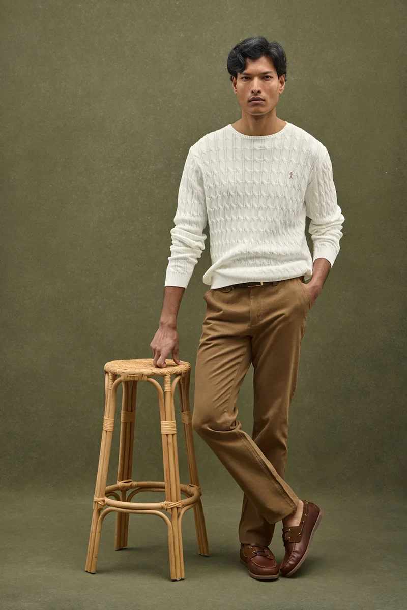 Nude cable-knit jumper with Rigby Go logo