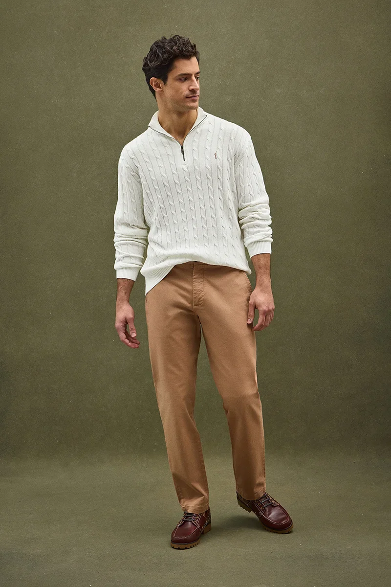 Nude cable-knit jumper with zipped neck and Rigby Go logo