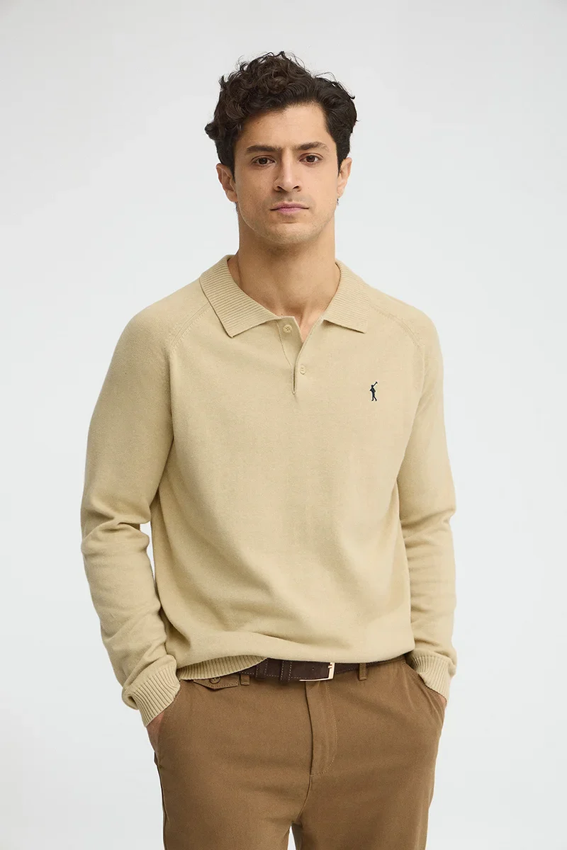 Beige jumper with buttoned polo collar and Rigby Go logo