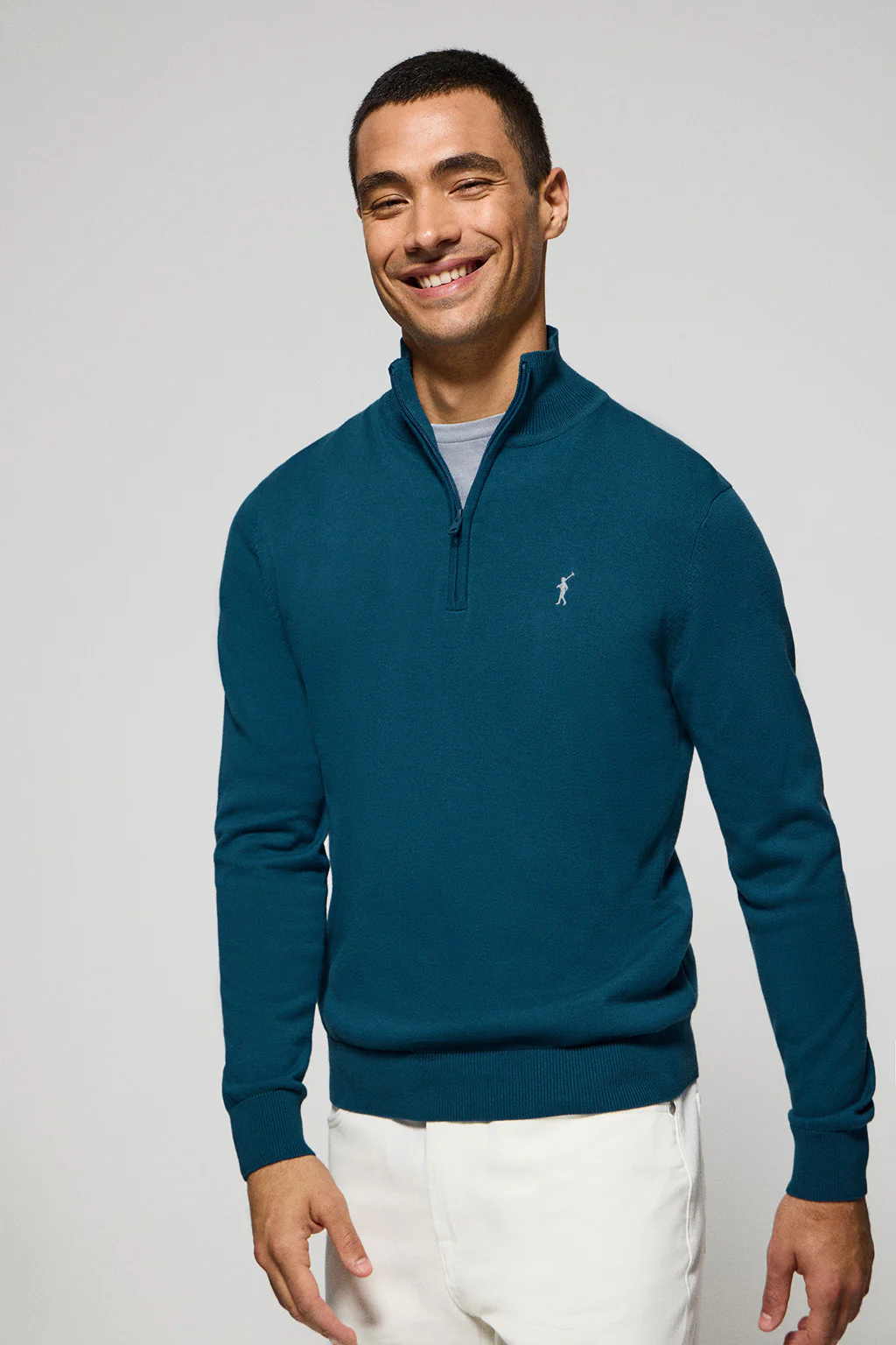 Greenish-blue knit jumper with zip and Rigby Go embroidered logo