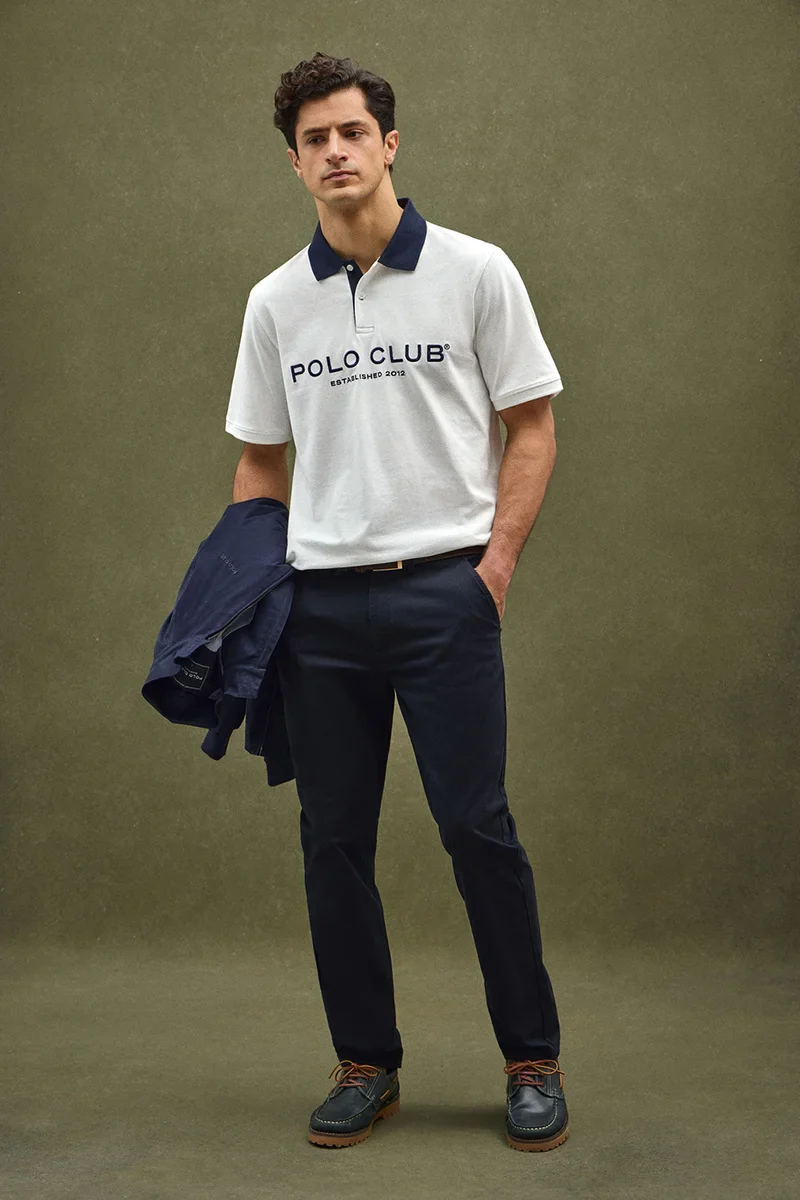 Nude polo shirt with collar and Established 2012 Polo Club logo in contrasting colour