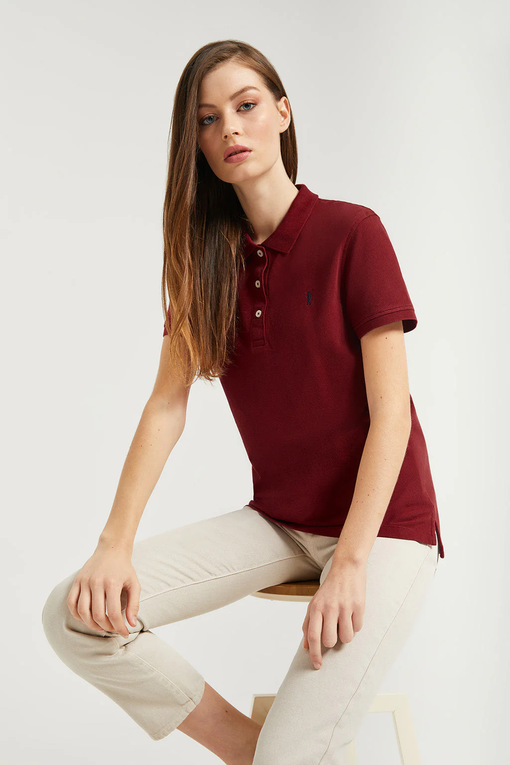 Maroon short-sleeve pique polo shirt with Rigby Go logo
