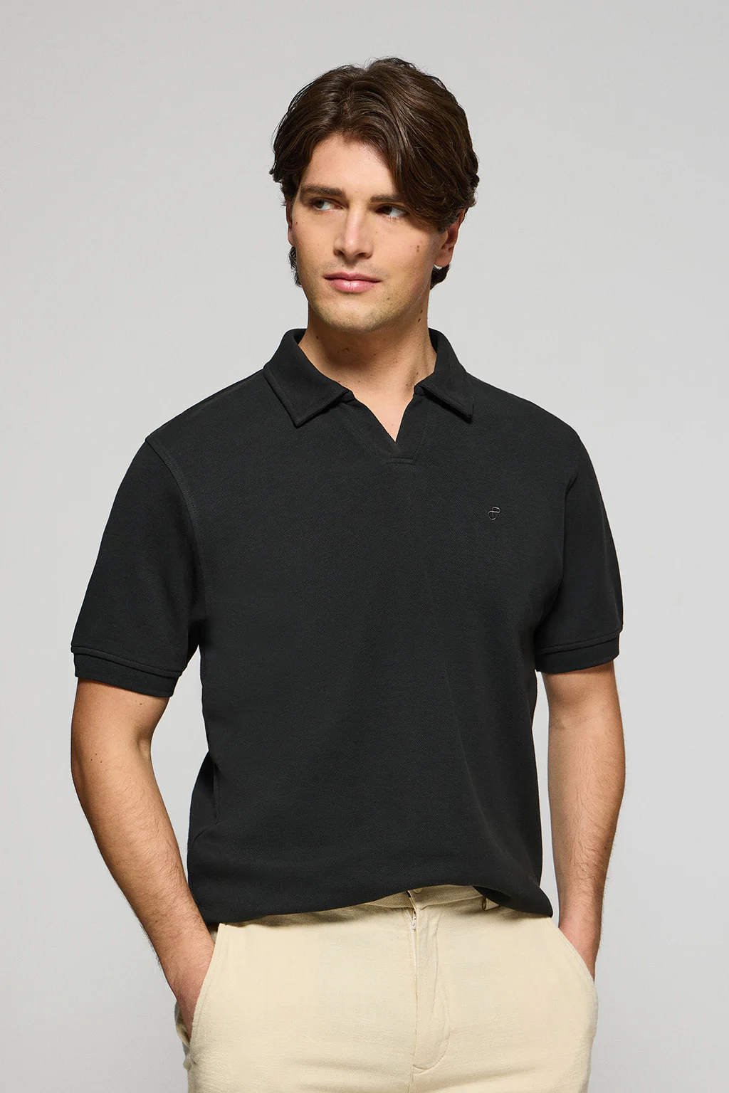 Black buttonless polo shirt Pascal with embroidered monogram