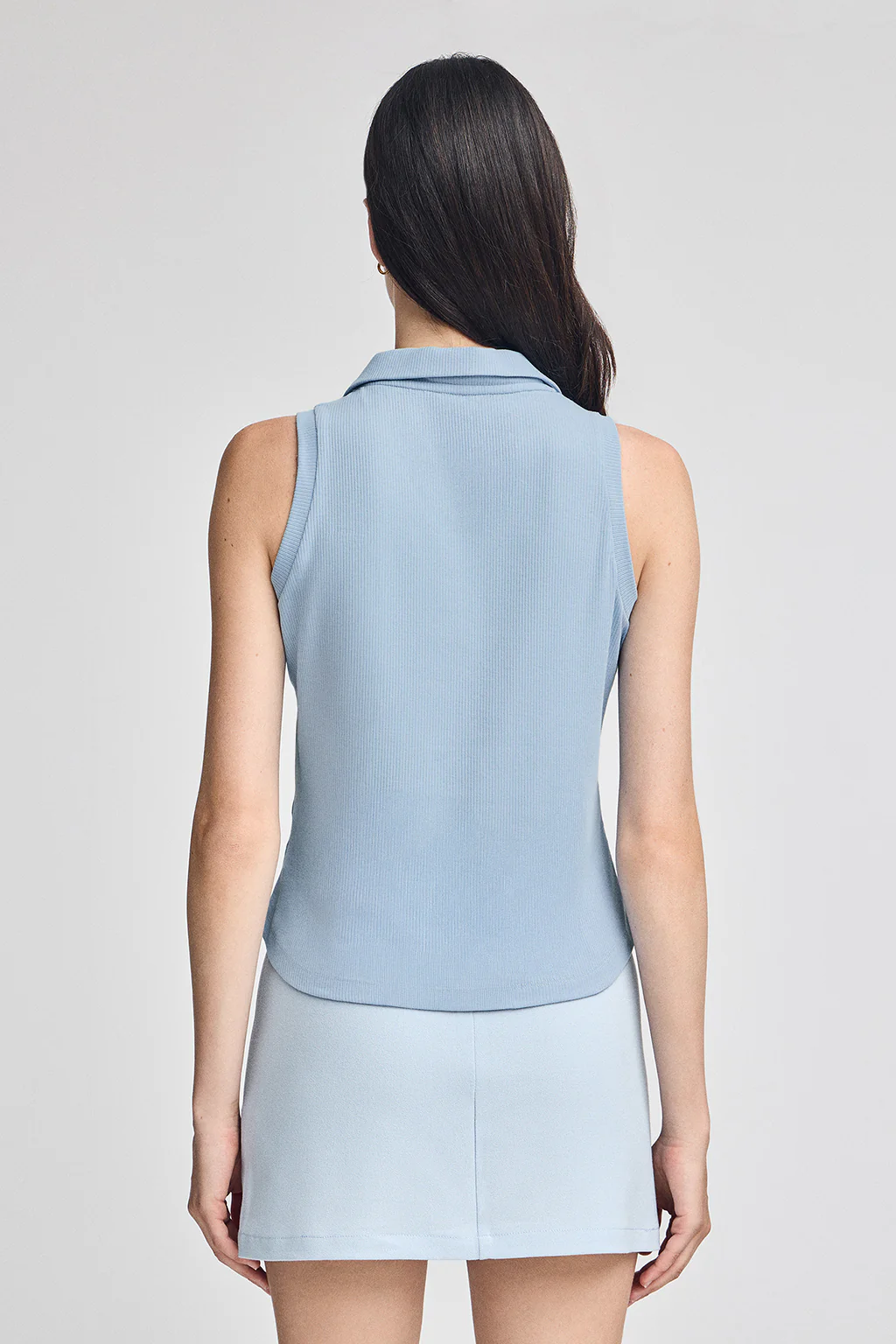 Light-blue sleeveless polo shirt with embroidered monogram - Image 2