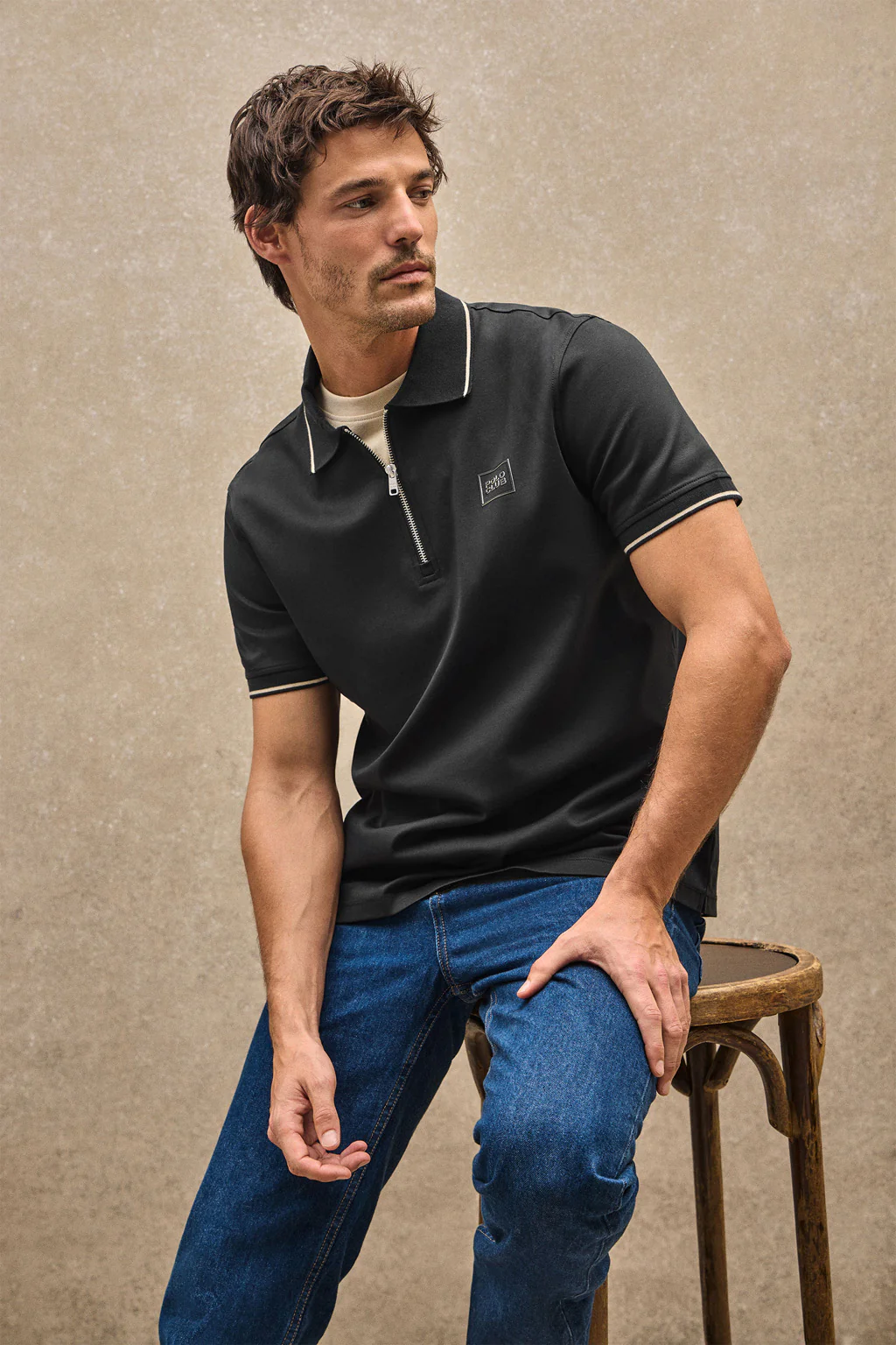 Black polo shirt Perseo with Polo Club rubber patch