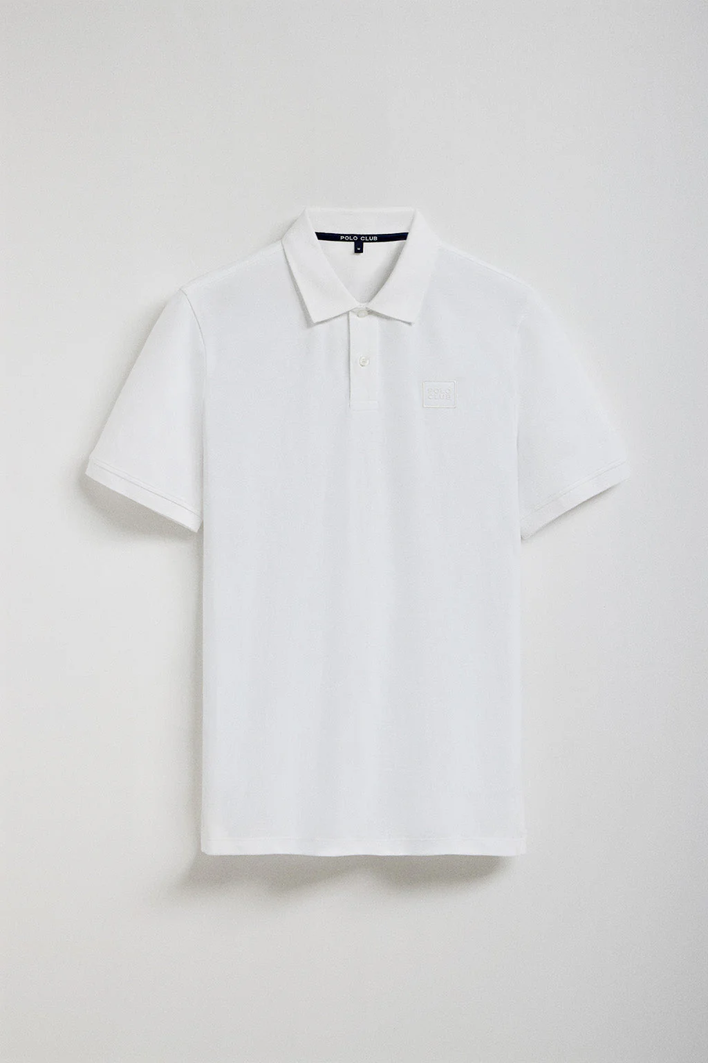 White two-button Portos polo shirt with Polo Club rubberised twill patch detail - Image 6