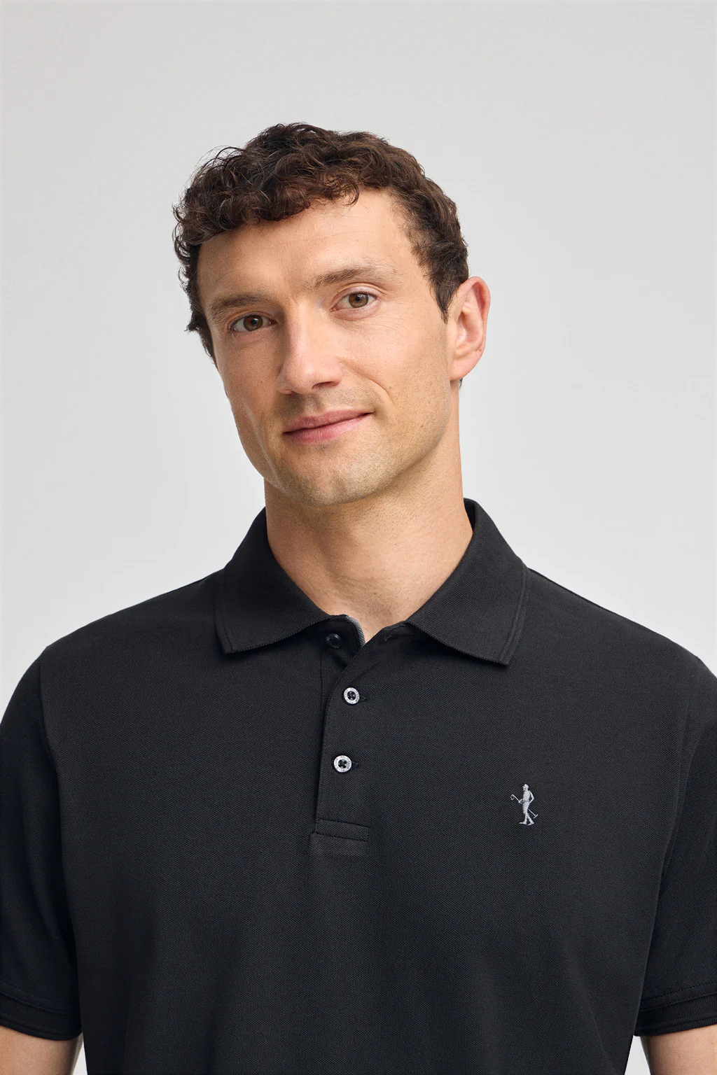 Black short-sleeve pique polo shirt with Rigby Best embroidery - Image 3