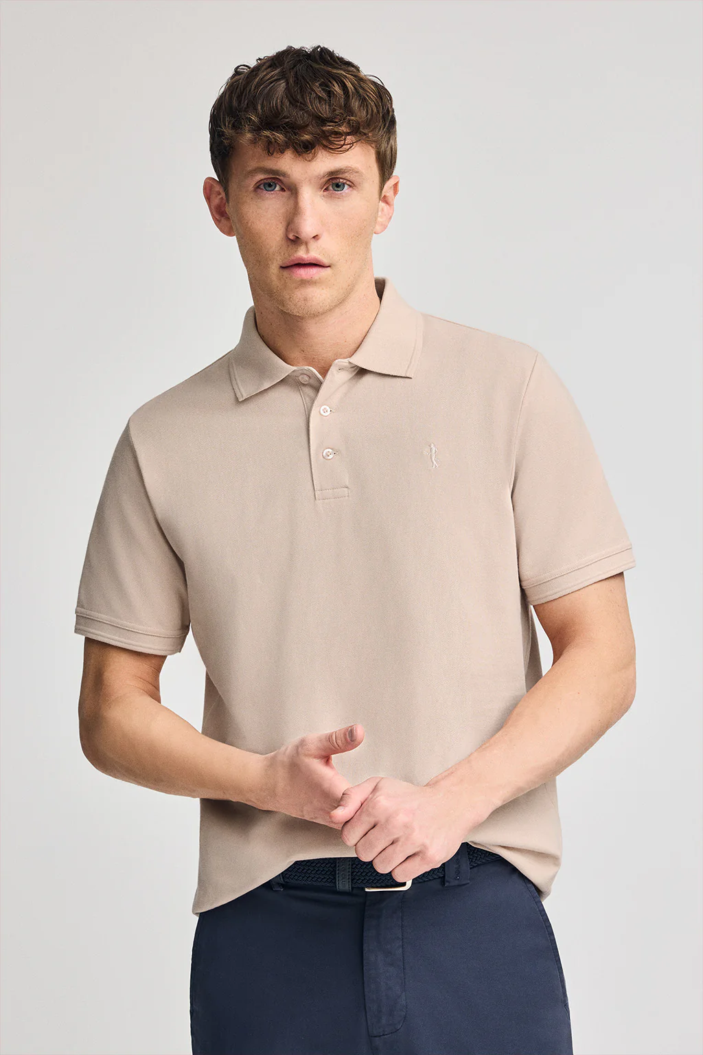 Blush-pink short-sleeve pique polo shirt with Rigby Best embroidery