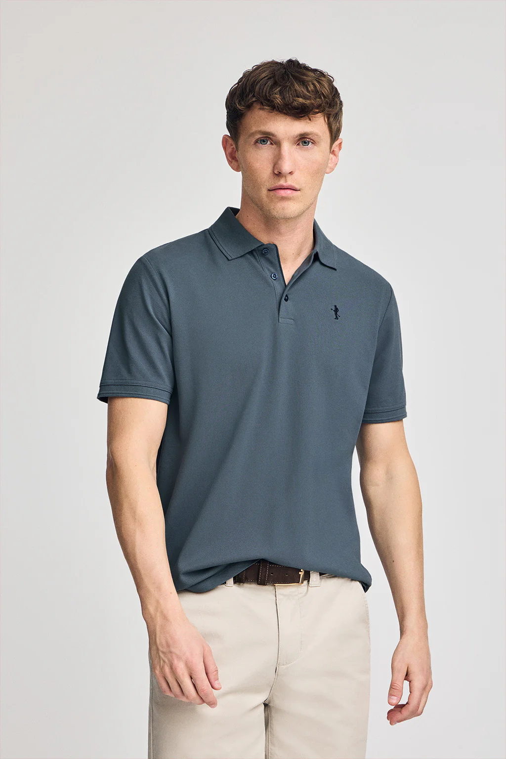 Denim-blue short-sleeve pique polo shirt with Rigby Best embroidery