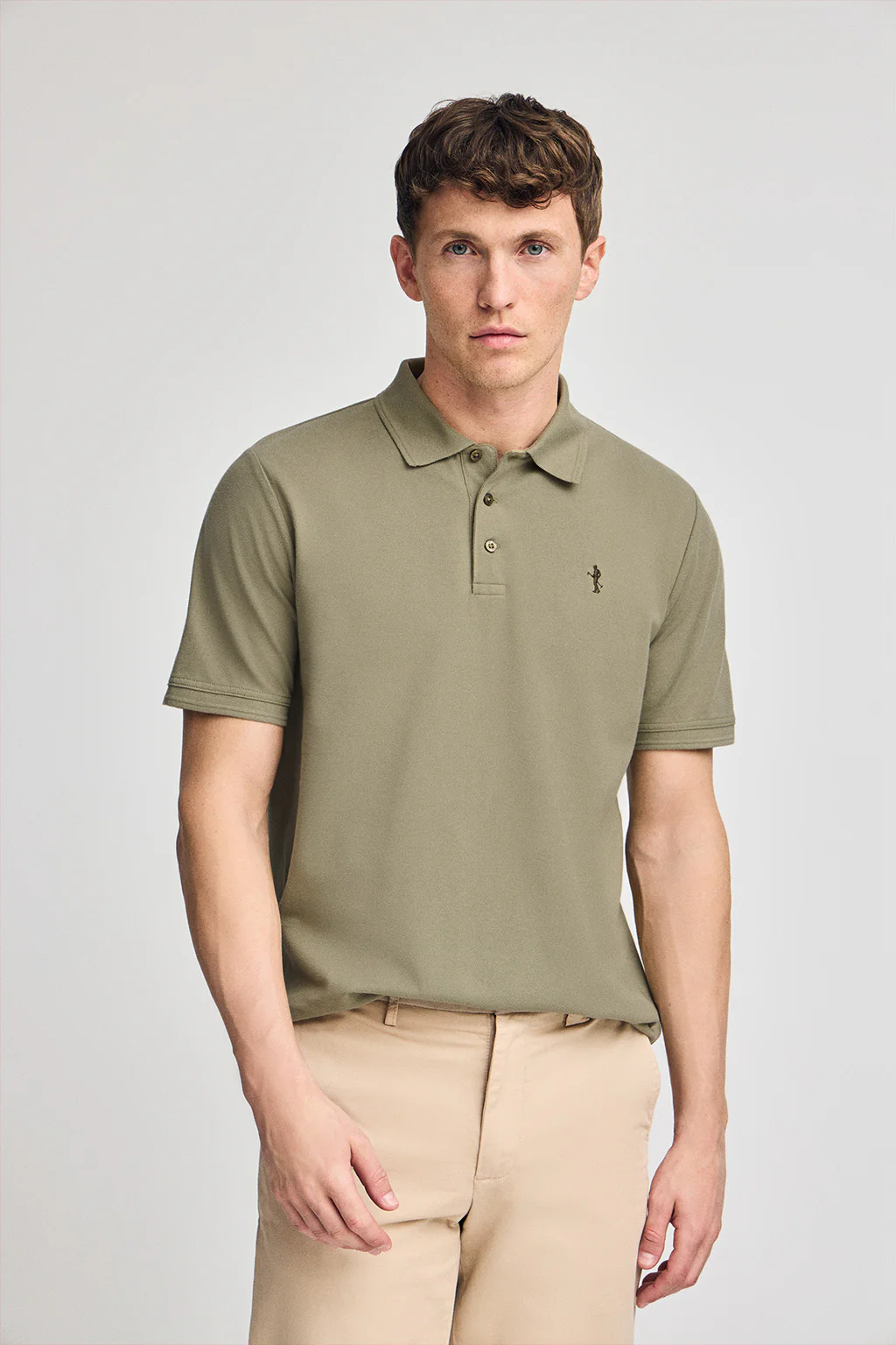 Light-green short-sleeve pique polo shirt with Rigby Best embroidery