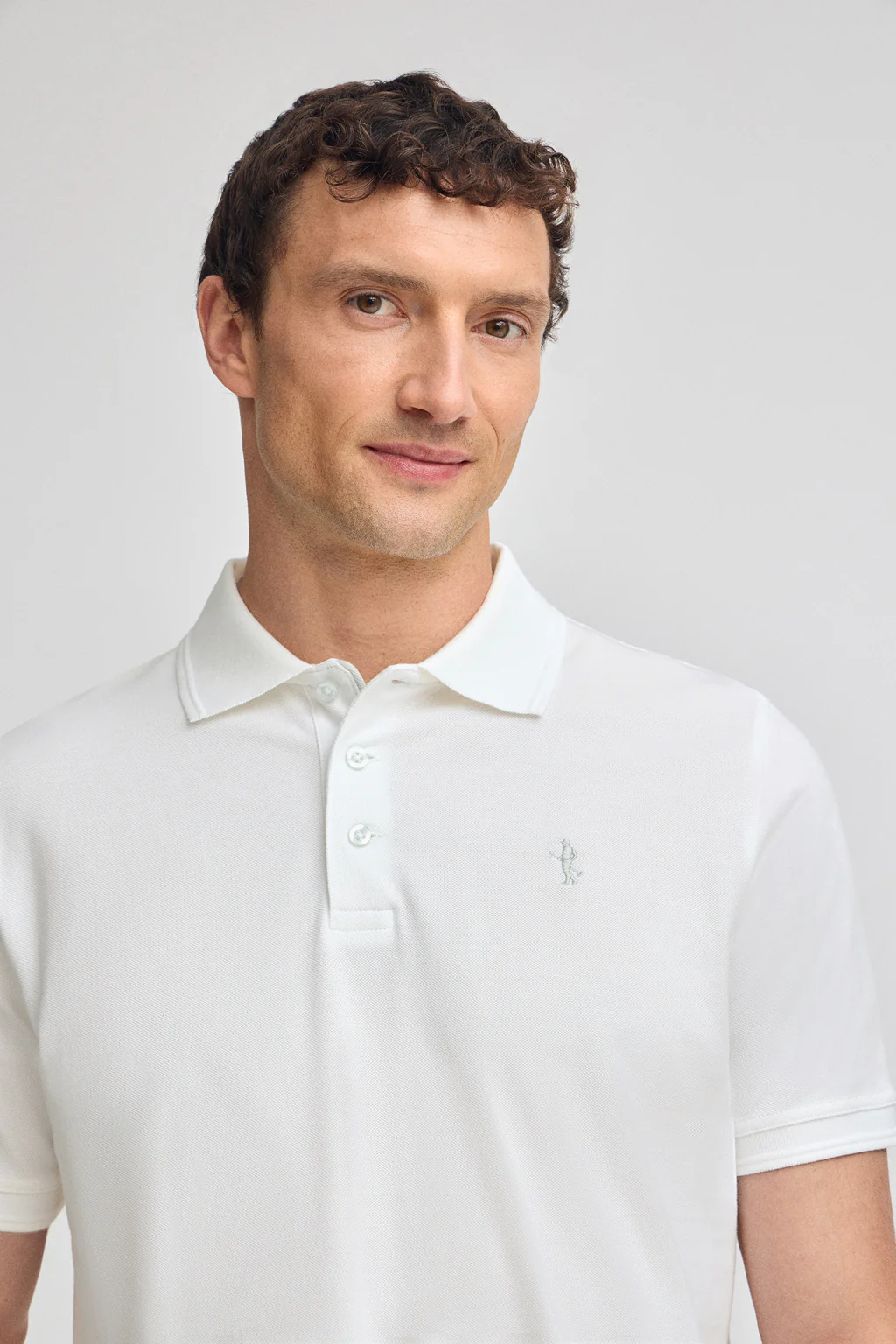 White short-sleeve pique polo shirt with Rigby Best embroidery - Image 3
