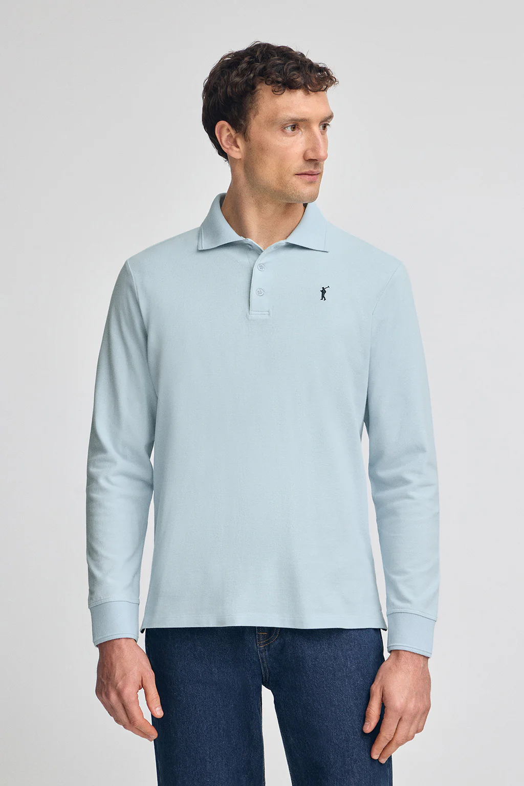 Light-blue long-sleeve polo shirt with three buttons and Rigby Go embroidery