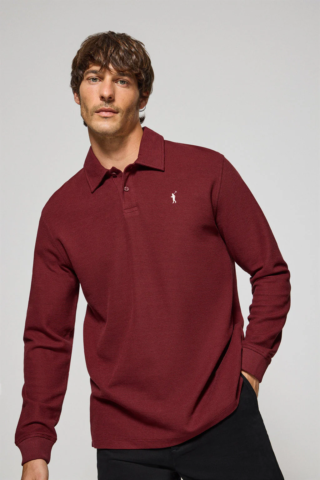 Maroon long-sleeve polo shirt with two buttons and Rigby Go logo