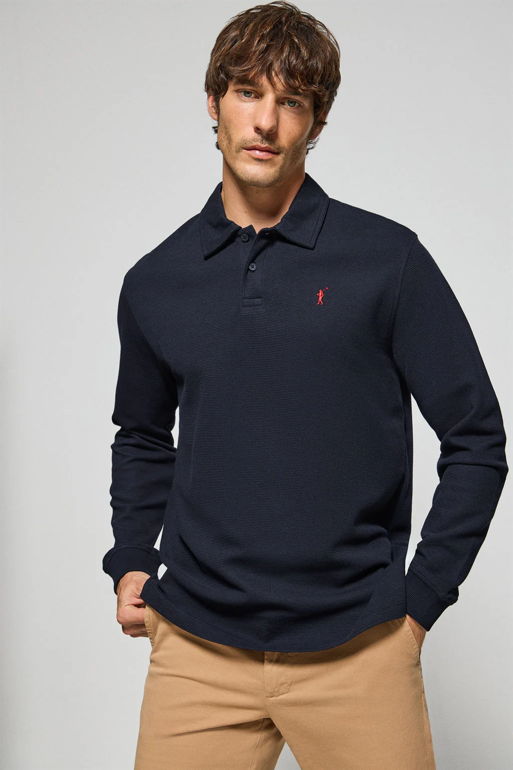 Navy-blue long-sleeve polo shirt with two buttons and Rigby Go logo