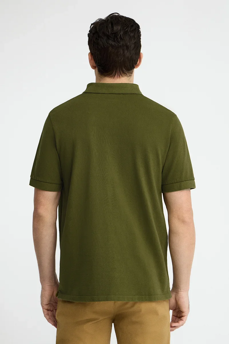 Moss-green garment-dyed polo shirt with Rigby Go embroidered logo - Image 4