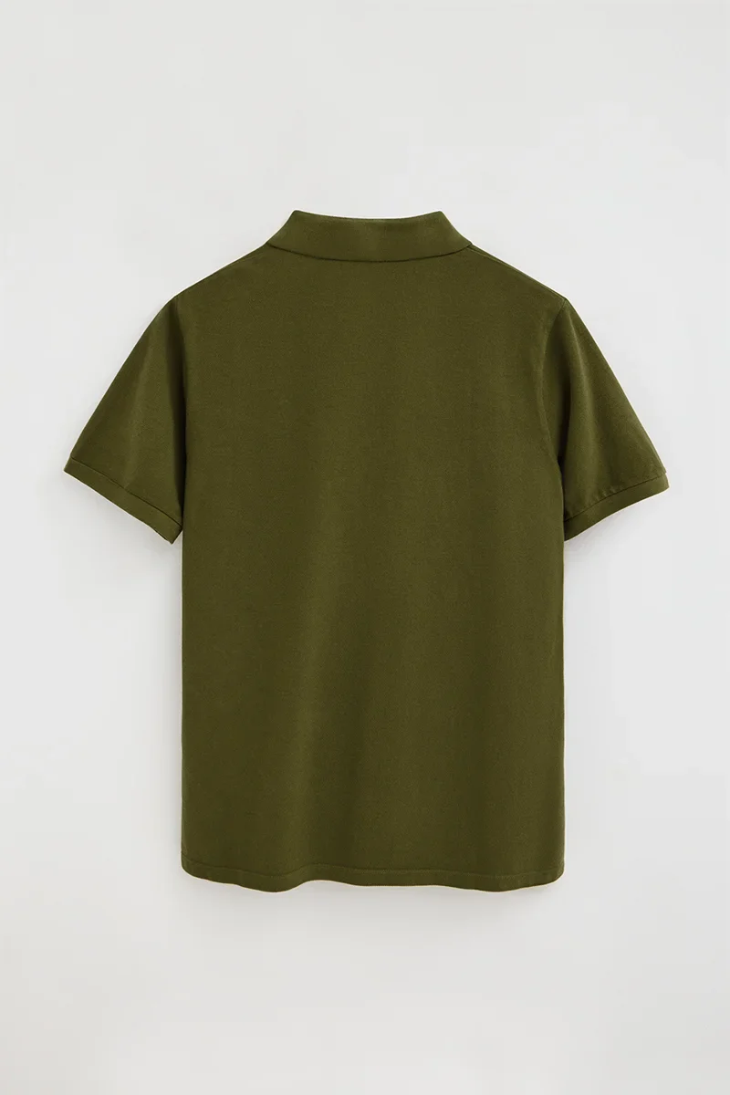 Moss-green garment-dyed polo shirt with Rigby Go embroidered logo - Image 7