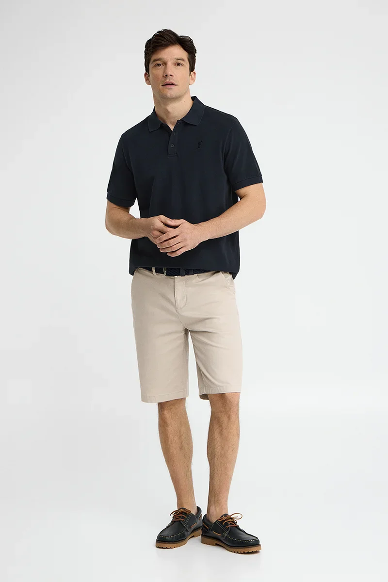 Navy-blue garment-dyed polo shirt with Rigby Go embroidered logo - Image 4