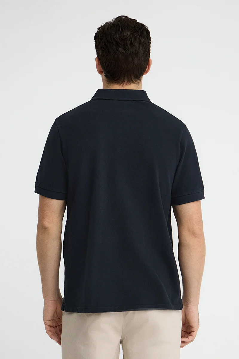 Navy-blue garment-dyed polo shirt with Rigby Go embroidered logo - Image 5