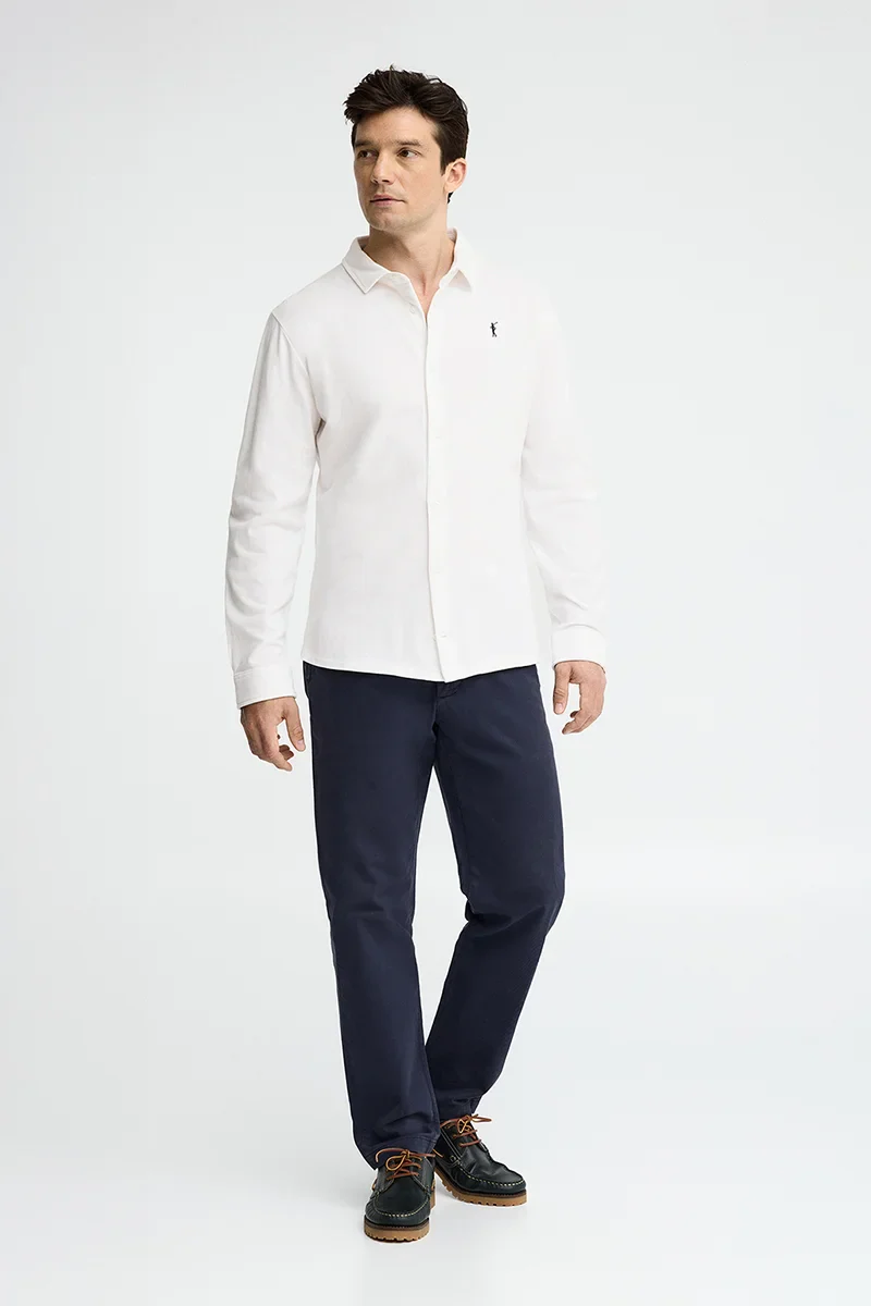 White full-button polo shirt with Rigby Go embroidery - Image 4