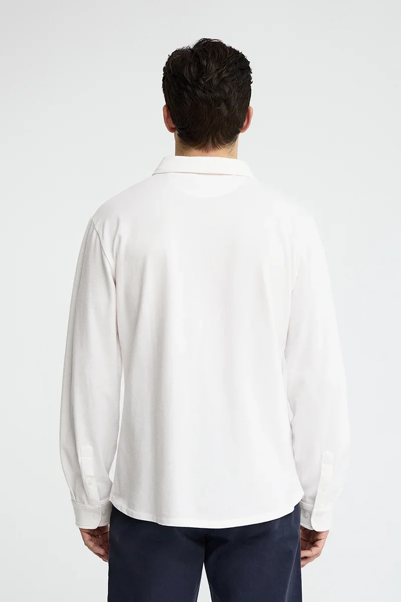 White full-button polo shirt with Rigby Go embroidery - Image 5