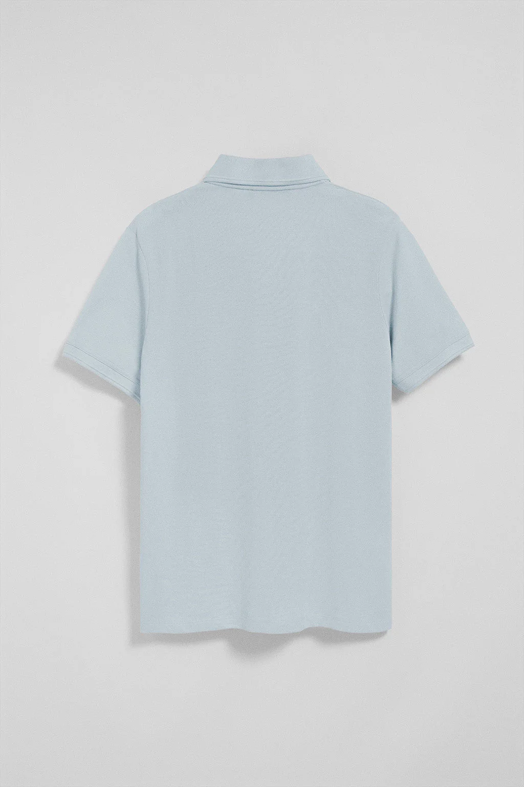 Light-blue polo shirt with three buttons and Rigby Go embroidered logo - Image 7