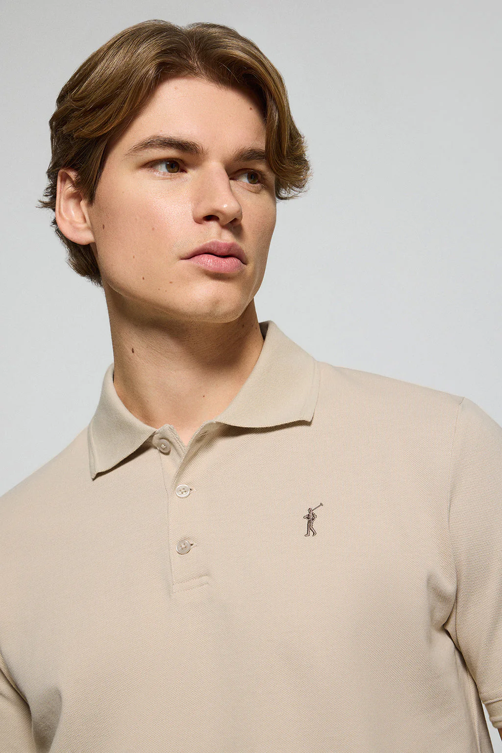 Beige polo shirt with three buttons and Rigby Go embroidered logo - Image 2