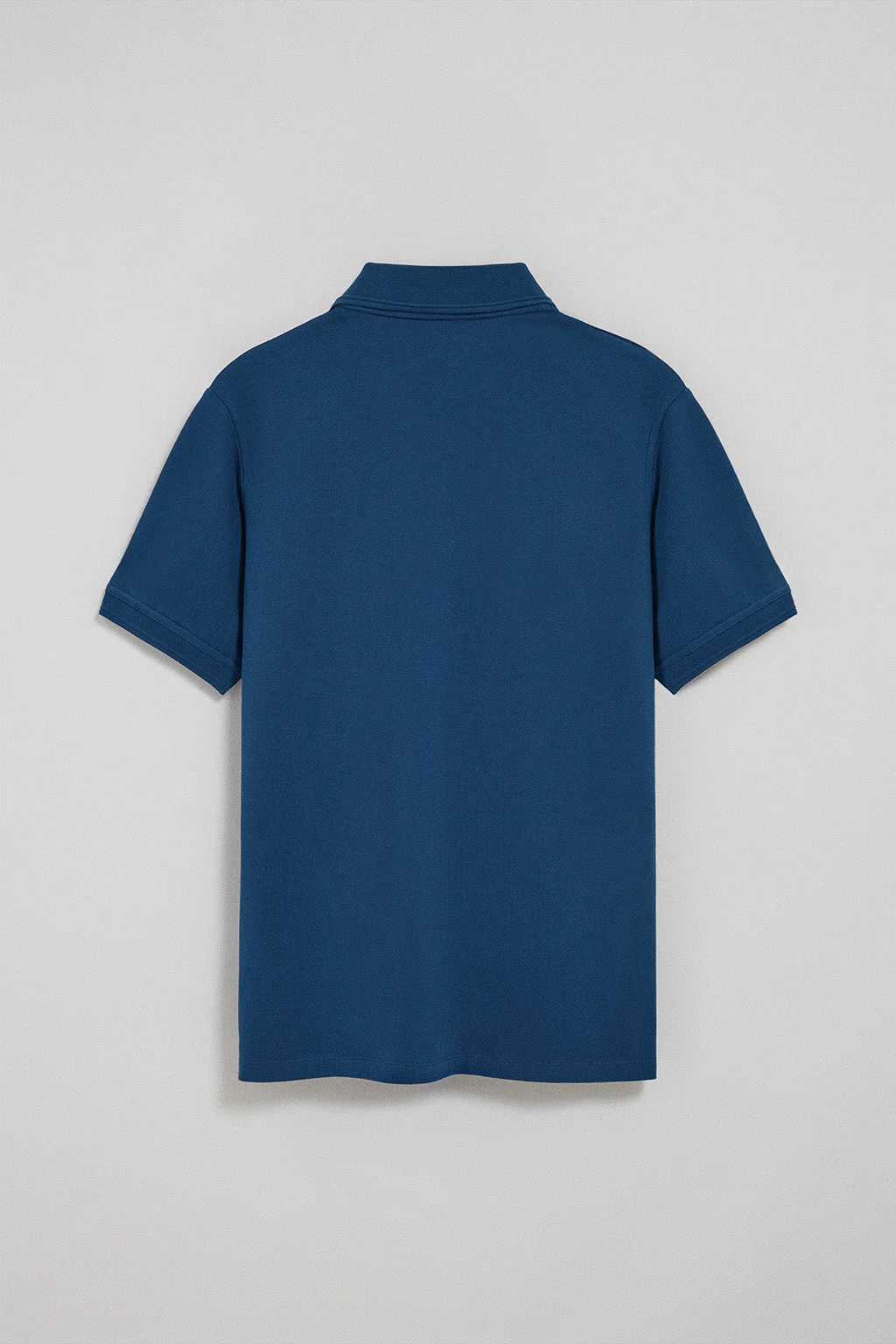Indigo-blue polo shirt with three buttons and Rigby Go embroidered logo - Image 7