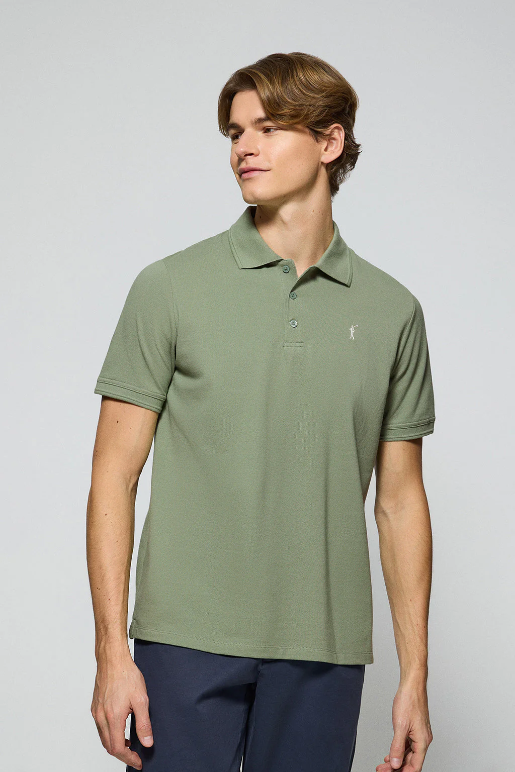 Jade-green polo shirt with three buttons and Rigby Go embroidered logo