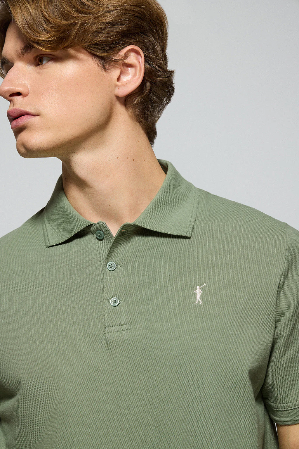 Jade-green polo shirt with three buttons and Rigby Go embroidered logo - Image 2