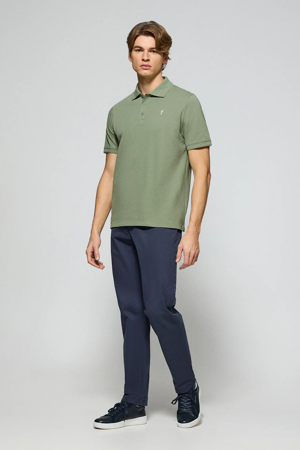 Jade-green polo shirt with three buttons and Rigby Go embroidered logo - Image 3