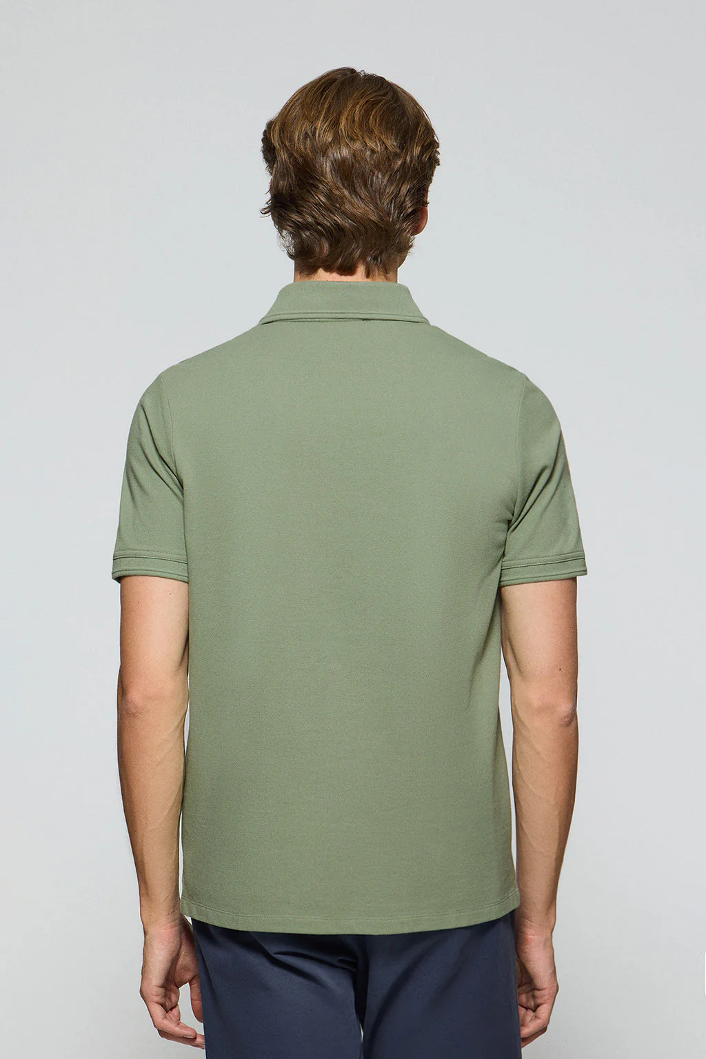 Jade-green polo shirt with three buttons and Rigby Go embroidered logo - Image 4
